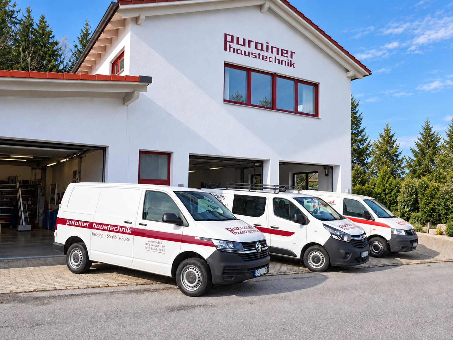 Firmengebäude und Servicefahrzeuge von Purainer Haustechnik